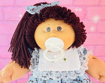 Vintage 1985 Cabbage Patch Kid Doll: Brown Hair, Pacifier Girl, UT Factory
