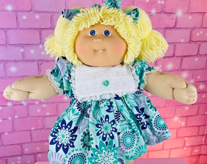 Vintage 1986 Cabbage Patch Kid Doll: Blonde Hair, Blue Eyes, Tooth Girl
