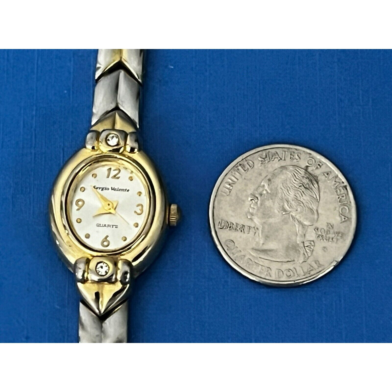 Vintage Y2K Sergio Valente Gold and Silver Women\'s Watch WITH REAL DIAMOND BEZEL Sergio Valente Two Tone Quartz 32mm Round Watch | eBay main image 4