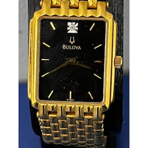 Bulova Quartz A3 2003 Stainless Steel Gold Tone Watch BLACK DIAL w diamond Bulova Quartz A3 2003 Stainless Steel Gold Tone Watch BLACK  main image 3