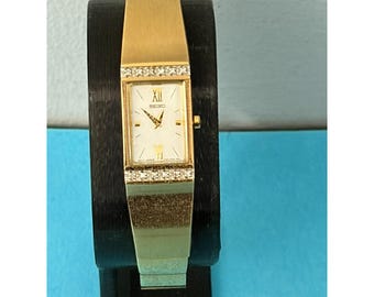 Vintage 1990'S Ladies Seiko Watch 1F20-0AF0 Gold Tone w diamonds needs battery