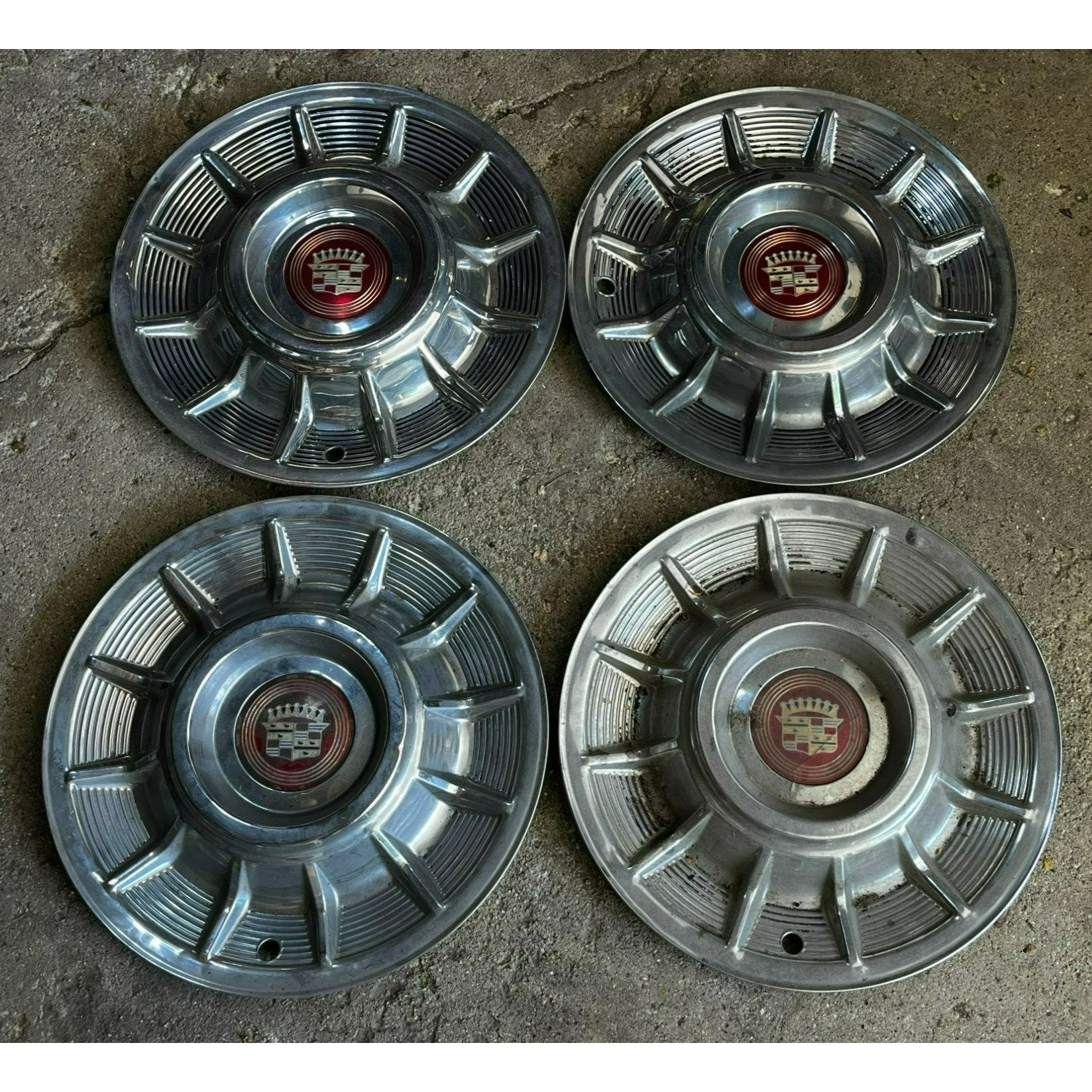 57 cadillac hubcaps discount