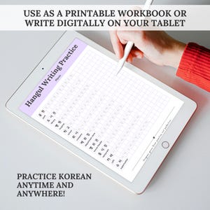 A hand with a stylus writes on a tablet that shows a lavender Hangul writing practice sheet, with text explaining that the Korean study workbook can be used as a printable PDF or as a digital workbook on a tablet. Keywords: Korean study workbook, Hangul writing practice, digital PDF, tablet notes.