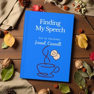 May include: A bright blue book titled Finding My Speech by Jewel Cassell, SLP in Training. The cover features a dark red line drawing of a coffee cup with steam rising into a speech bubble containing a smiling face icon, centered on the front.