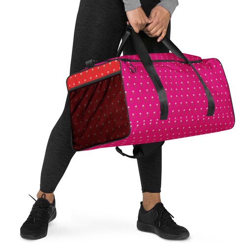 Pink and Orange shops Daisy Duffle bag