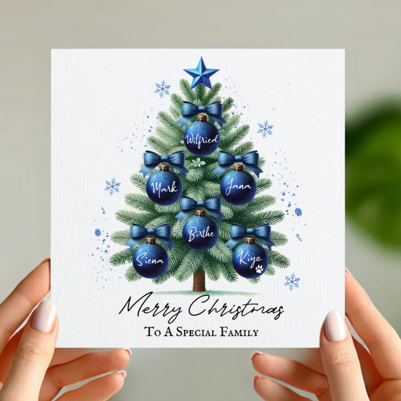 May include: A blue and green Christmas card with a blue Christmas tree decorated with blue ornaments and blue bows. The ornaments have names written on them: Wilfried, Mark, Jana, Birthe, Sienna, Kiya. The text on the card reads "Merry Christmas To A Special Family".