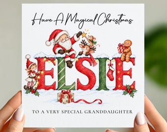May include: A square Christmas greeting card featuring the text Have A Magical Christmas at the top and TO A VERY SPECIAL GRANDDAUGHTER at the bottom. The name ELSIE is spelled out in large, festive red and green letters decorated with snow.