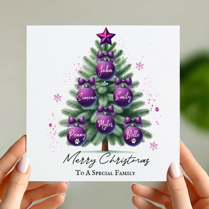 May include: Purple and white Christmas card with a watercolor illustration of a Christmas tree with ornaments that have names on them. The text reads "Merry Christmas To A Special Family".