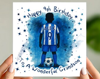 May include: A square birthday card featuring a soccer player in a blue and white uniform with the name "ALEX" and the number "9". The card reads "Happy 9th Birthday To A Wonderful Grandson" with star accents.