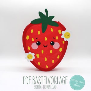 May include: A red and green paper craft template of a strawberry with a smiling face and white flowers. The template is labelled "PDF Bastelvorlage" and "Sofort-Download".