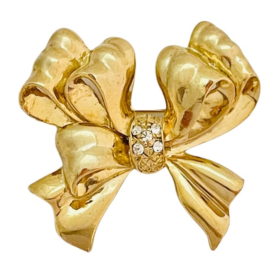 Vintage shiny gold bow brooch