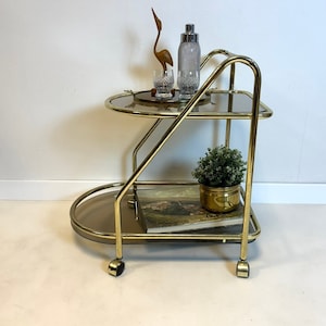 Vintage Hollywood Regency brass/smoked glass BAR CART