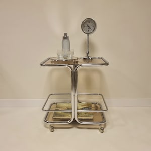 Vintage Hollywood Regency chrom big trolley table with smoky glass. Mid Century wheels Bar Cart