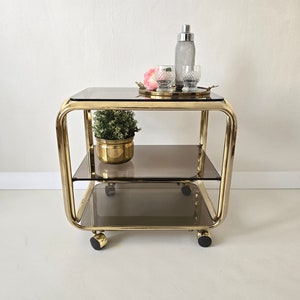 Vintage Hollywood Regency brass/smoked glass BAR CART