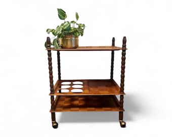 Vintage Mid Century Modern trolley table of pressed wood veneer. MCM wheels Bar Cart