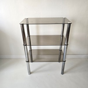 Vintage Mid Century Modern Chrome and smoky glasses rack or Hifi table. Heavy and strong construction.