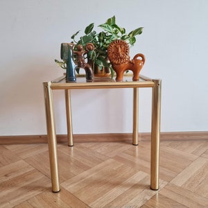 Vintage Hollywood Regency Modern Chrome tafel met rookglas.
