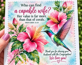 May include: A square greeting card with a scalloped edge featuring a watercolor illustration of pink hibiscus flowers, green leaves, and a hummingbird. The text reads: Who can find a capable wife? Her value is far more than that of corals. PROVERBS 31:10. Thank you for sharing your husband with the Congregation! We love you!
