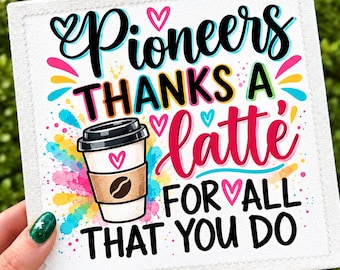 May include: A square white fabric patch with a colorful graphic featuring a coffee cup and the text Pioneers THANKS A latte FOR ALL THAT YOU DO. The design includes pink, blue, and yellow paint splatters and small heart icons.