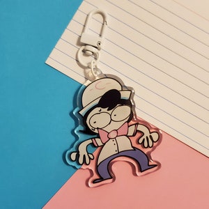 Llavero acrílico de doble cara de Scared Kevin The Candy Man con el mismo diseño