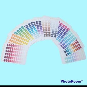 May include: A set of 12 sheets of cloud stickers in various colors, including pink, red, orange, yellow, green, blue, purple, grey, brown, and white. Each sheet has 49 cloud stickers.