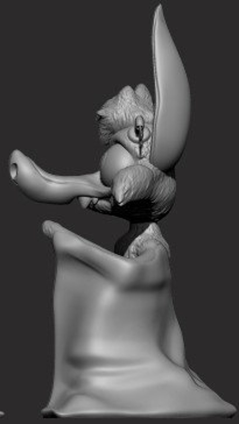 May include: A 3D printed model of a cartoon coyote with a large, pointed nose and ears. The model is painted in shades of gray and has a textured surface.