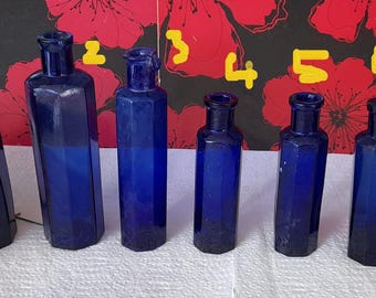 Edwardian blue cylinder cure bottles.