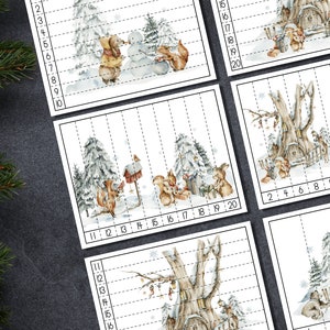 May include: A set of printable winter-themed number lines with illustrations of a snowy forest, a squirrel, a birdhouse, and a snowman. The number lines are numbered from 1 to 20.