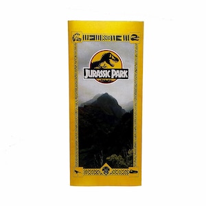 May include: A rectangular yellow card featuring the Jurassic Park logo at the top, which includes a black dinosaur silhouette inside a circle. Below the logo is a dark mountain landscape. The border has black geometric patterns and small icons.