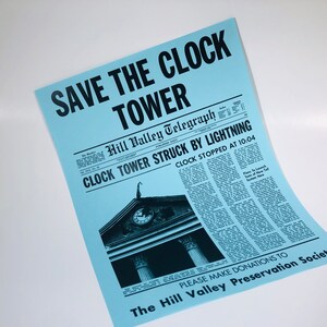 May include: A blue poster with the text "SAVE THE CLOCK TOWER" in black. The poster features a black and white image of a clock tower with the text "Hill Valley Telegraph" and "CLOCK TOWER STRUCK BY LIGHTNING" in black. The text "CLOCK STOPPED AT 10:04" is also in black. The poster also includes the text "PLEASE MAKE DONATIONS TO The Hill Valley Preservation Society" in black.