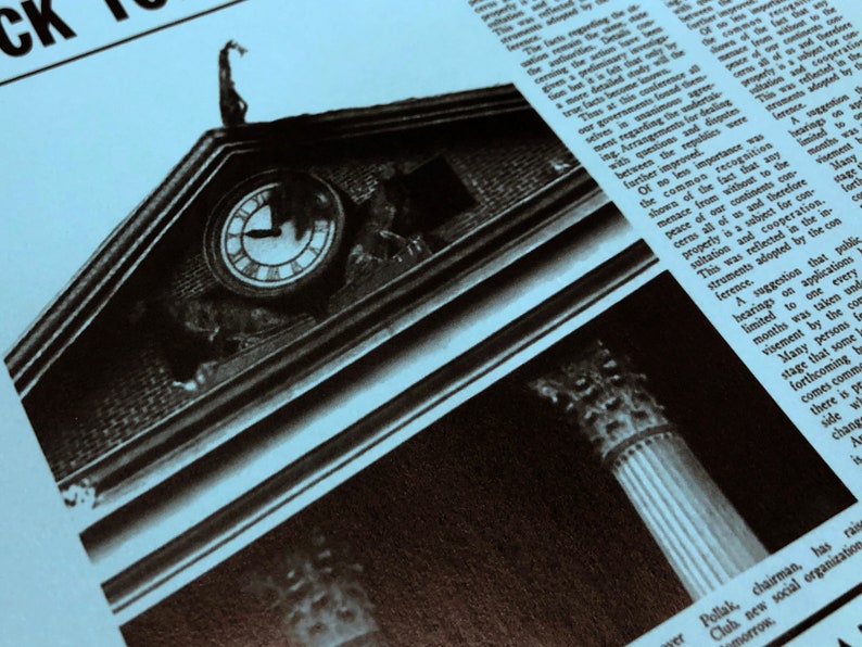 May include: A black and white newspaper clipping with a photo of a clock tower. The clock face is visible and the hands are pointing to the time. The text in the newspaper clipping is about a conference and the importance of cooperation.