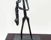 Metallic 5.5 in. Tall Statue of a Saxophone Player by "D Ringer"