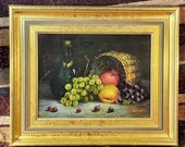 Oil painting "Still Life with Bottle and Basket of Fruit" by Carlos Huangal Campos