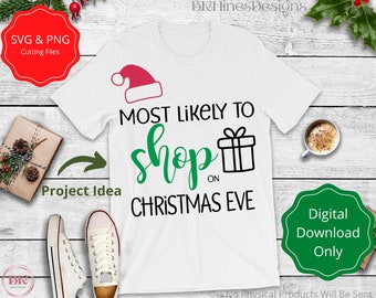 May include: White t-shirt with a green and black graphic that says "Most likely to shop on Christmas Eve". The graphic also includes a red Santa hat and a black gift box.