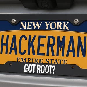 May include: A black license plate frame with a New York license plate. The license plate is yellow with the word "HACKERMAN" in large blue letters. Below it, the text "EMPIRE STATE" and "GOT ROOT?" are visible.