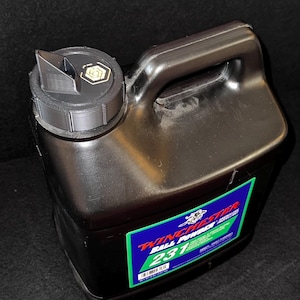 May include: A black plastic jug with a black and gold cap and a label that says "Winchester Ball Powder 231".