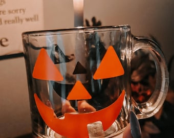 Jaco-o-lantern face glass mug