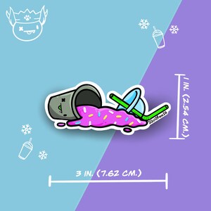 May include: A spilled pink and white slushie with sprinkles in a gray cup with a green straw and a white lid. The cup is lying on its side and the slushie is spilling out. The text "SQUIDfeeSH" is written on the straw.