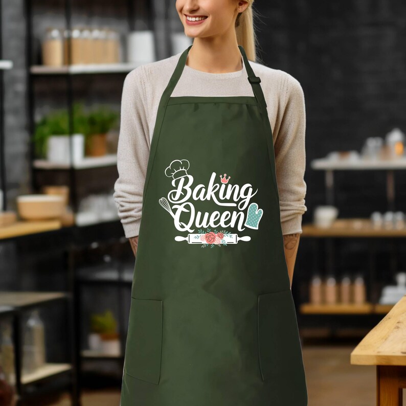 a woman wearing an apron that says baking queen