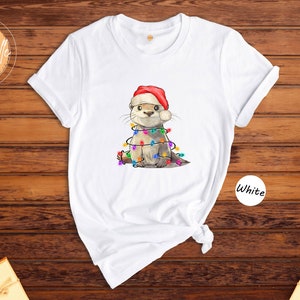 Cute Christmas Animal Shirt, Otter Christmas Light Shirt, Christmas 2025 Gift, Funny Christmas Tee