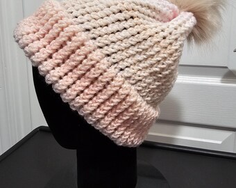 Handmade loom-knitted pink sparkle beanie with brown pom pom