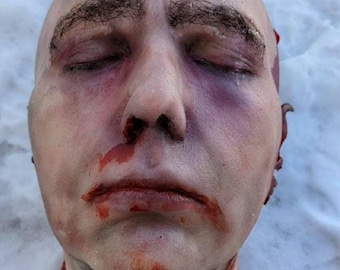 Bloody severed head prop