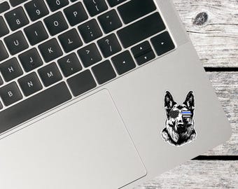 K9 con adesivo per occhiali con linea blu sottile