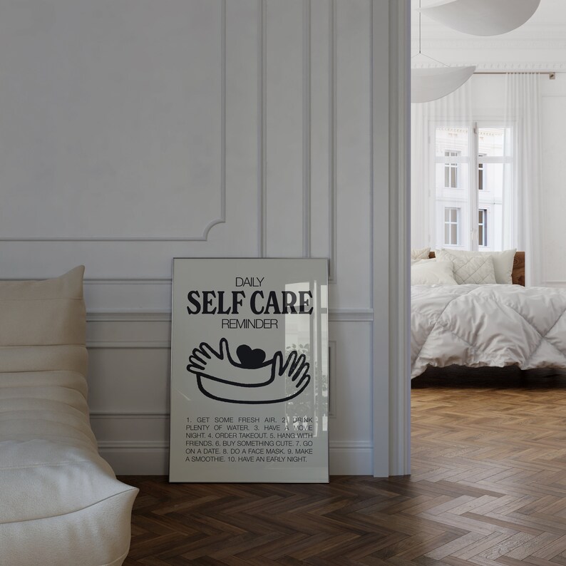 May include: A black and white poster with the text "Daily Self Care Reminder" and a graphic of two hands holding a heart. The poster lists 10 self-care tips, including getting fresh air, drinking water, and having a movie night.