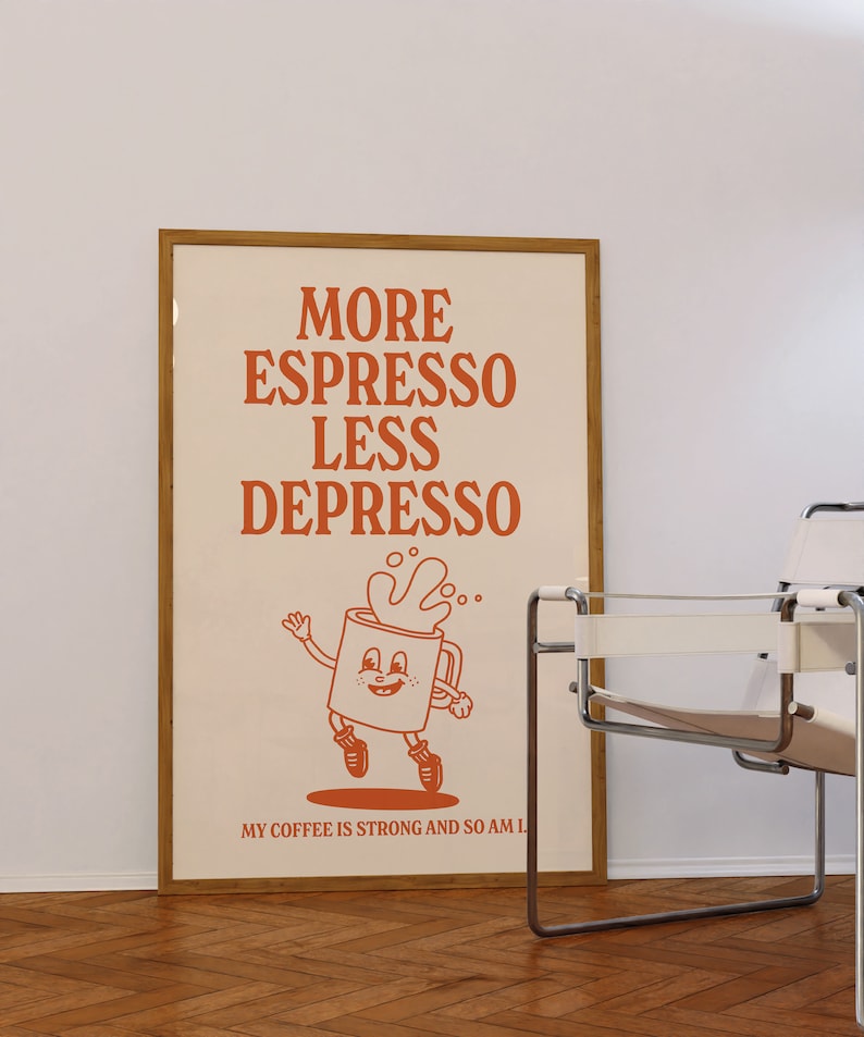 May include: A framed poster with the words "MORE ESPRESSO LESS DEPRESSO" in orange lettering. The poster features a cartoon coffee cup character and the text "MY COFFEE IS STRONG AND SO AM I."