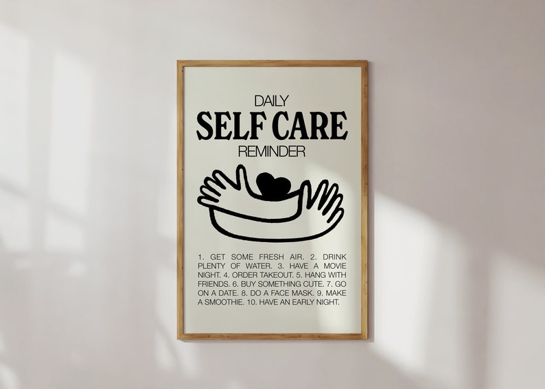 May include: A printable poster with a black and white illustration of two hands holding a heart. The text reads "Daily Self Care Reminder" and lists ten self-care tips.