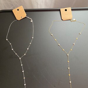 Gold and silver tie necklace in stainless steel News image 1