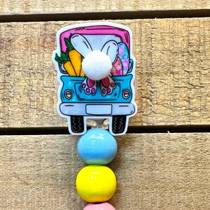 Bobine d'insigne de camion de Pâques avec pompon pour la queue et perles en option