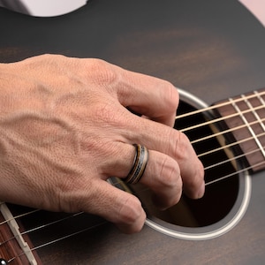 Guitar Ring while playing the guitar