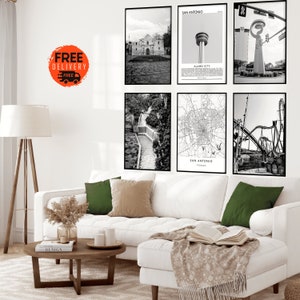 May include: A set of six black and white framed prints featuring various images of San Antonio, Texas. The prints include a view of the Alamo, a map of the city, a river scene, a roller coaster, and a view of the city skyline.
